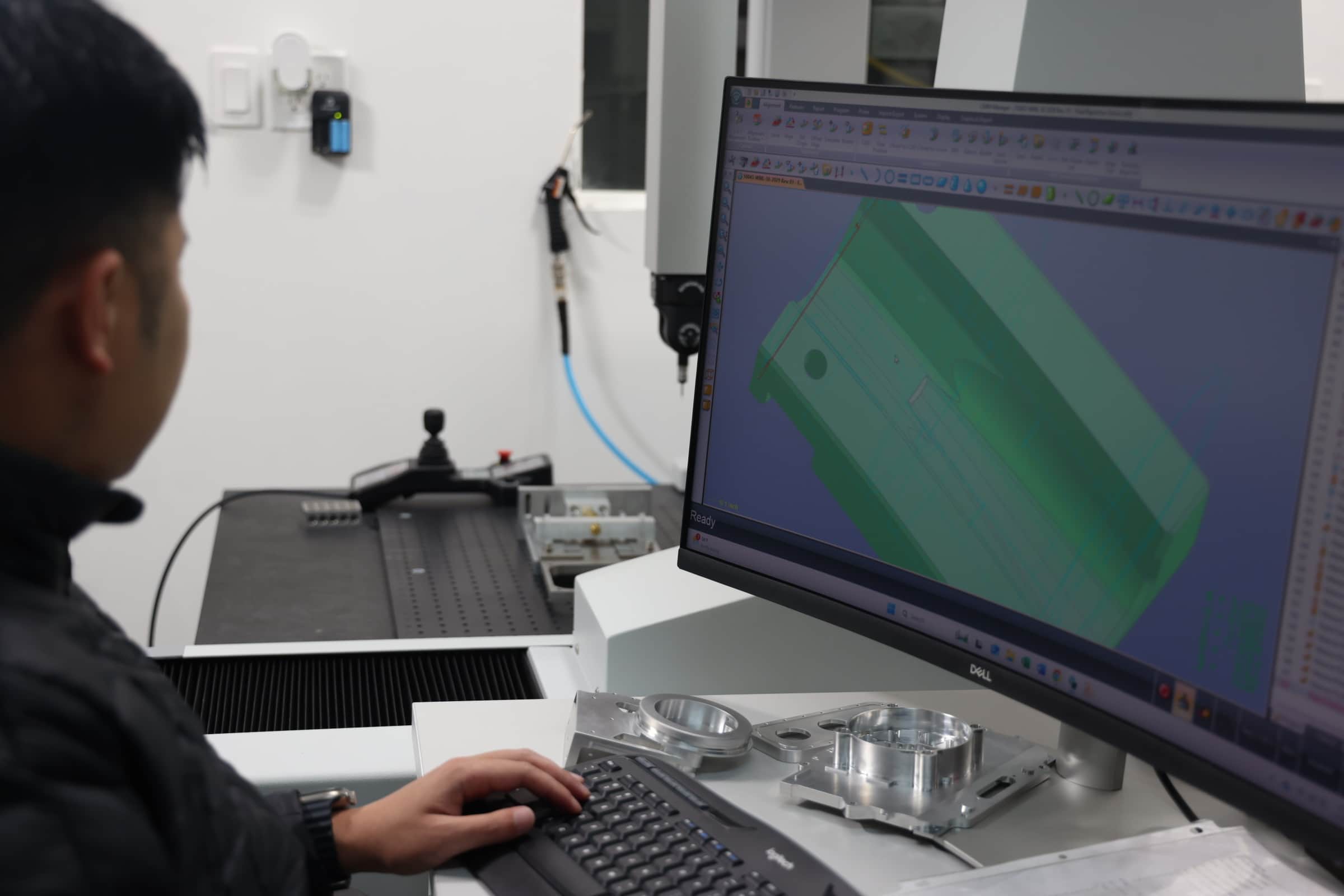 Precision machined prototype component prepared for inspection